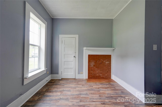 210 Moriah School Rd, Casar, NC 28020 - spare room featuring wood finished floors, baseboards, and ornamental molding