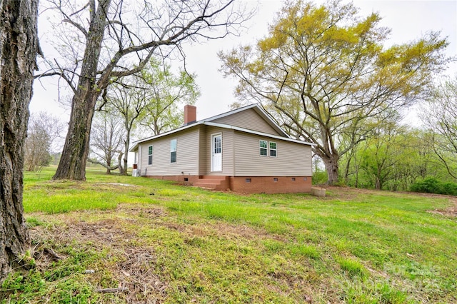 210 Moriah School Rd, Casar, NC 28020 - view of property exterior featuring crawl space, a chimney, a yard, and entry steps