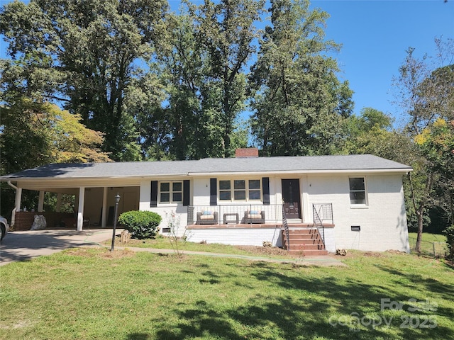 148 Palaside Dr NE, Concord, NC 28025 - ranch-style house with covered porch, a carport, a front lawn, brick siding, and a chimney