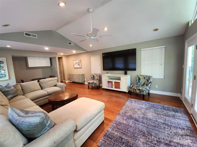 148 Palaside Dr NE, Concord, NC 28025 - living room with a ceiling fan, visible vents, wood finished floors, lofted ceiling, and baseboards