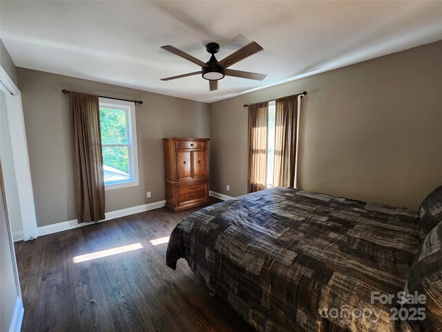 148 Palaside Dr NE, Concord, NC 28025 - bedroom with baseboards, a ceiling fan, and wood finished floors