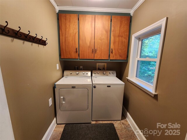 148 Palaside Dr NE, Concord, NC 28025 - laundry area featuring crown molding, washing machine and clothes dryer, baseboards, and cabinet space