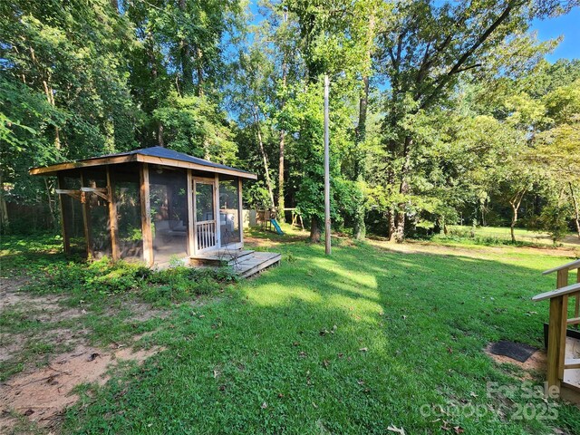 148 Palaside Dr NE, Concord, NC 28025 - view of yard featuring an outbuilding