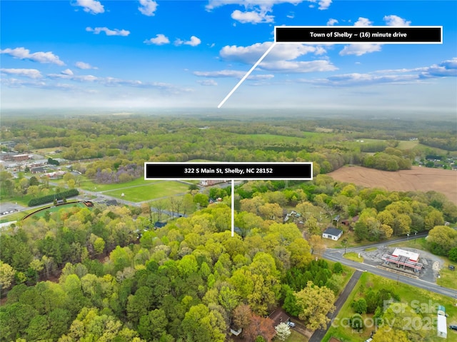 bird's eye view with a forest view