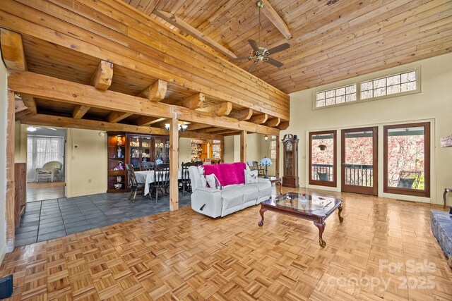 63 Chestnut Forest Rd, Fairview, NC 28730 - living area with wooden ceiling, ceiling fan, a high ceiling, and baseboards