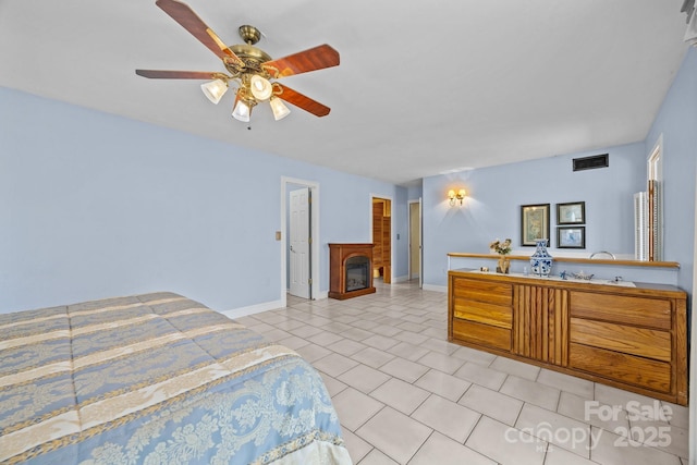 63 Chestnut Forest Rd, Fairview, NC 28730 - bedroom with light tile patterned floors, visible vents, a fireplace, and baseboards