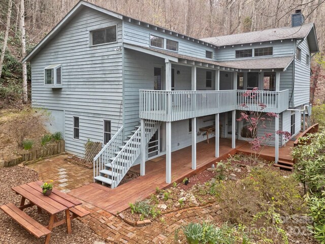 63 Chestnut Forest Rd, Fairview, NC 28730 - back of house featuring a patio area, a deck, stairs, and a chimney