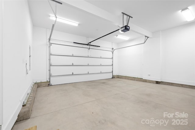 210 Walford Dr, Charlotte, NC 28208 - garage with a garage door opener and baseboards