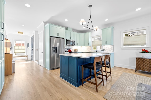 210 Walford Dr, Charlotte, NC 28208 - kitchen with stainless steel appliances, plenty of natural light, and blue cabinets