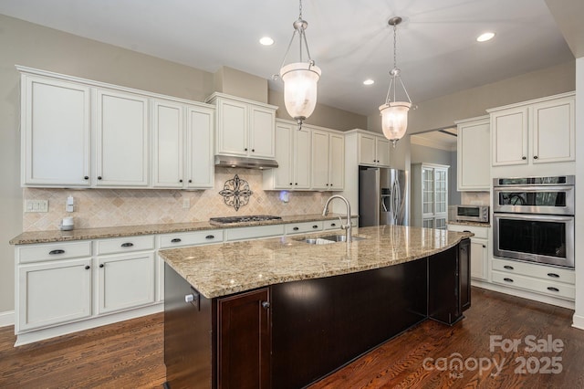 6352 Willow Farm Dr, Denver, NC 28037 - kitchen with a sink, decorative backsplash, pendant lighting, appliances with stainless steel finishes, and under cabinet range hood