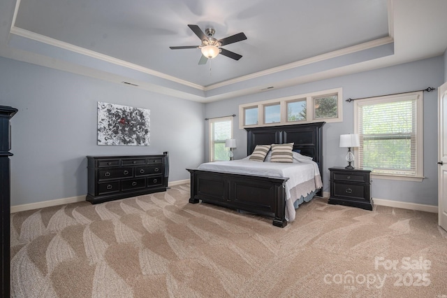 6352 Willow Farm Dr, Denver, NC 28037 - bedroom featuring light colored carpet, multiple windows, crown molding, and a tray ceiling