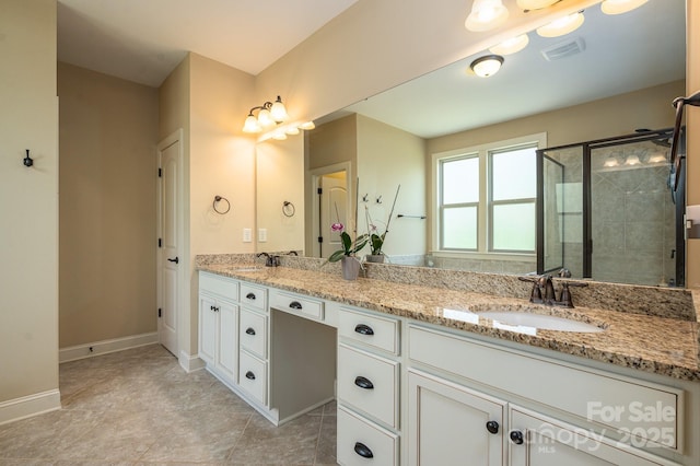 6352 Willow Farm Dr, Denver, NC 28037 - full bath featuring double vanity, a sink, visible vents, and a stall shower