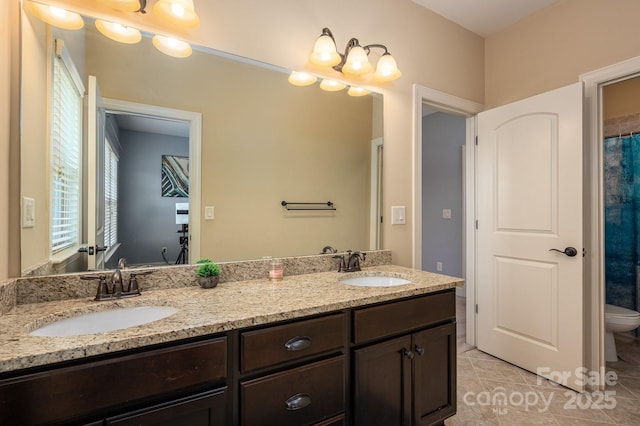 6352 Willow Farm Dr, Denver, NC 28037 - full bath with double vanity, tile patterned floors, toilet, and a sink