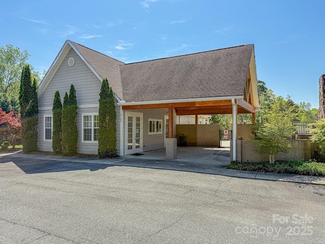 6352 Willow Farm Dr, Denver, NC 28037 - view of front of property featuring fence, french doors, and roof with shingles