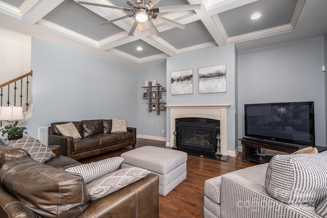 6352 Willow Farm Dr, Denver, NC 28037 - living area featuring beamed ceiling, coffered ceiling, a glass covered fireplace, wood finished floors, and a ceiling fan
