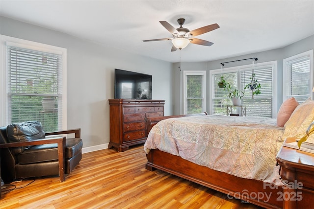 1050 Merrywood Dr, Newton, NC 28658 - bedroom featuring baseboards, light wood finished floors, and a ceiling fan