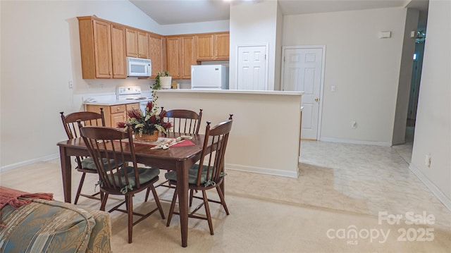 dining room with baseboards