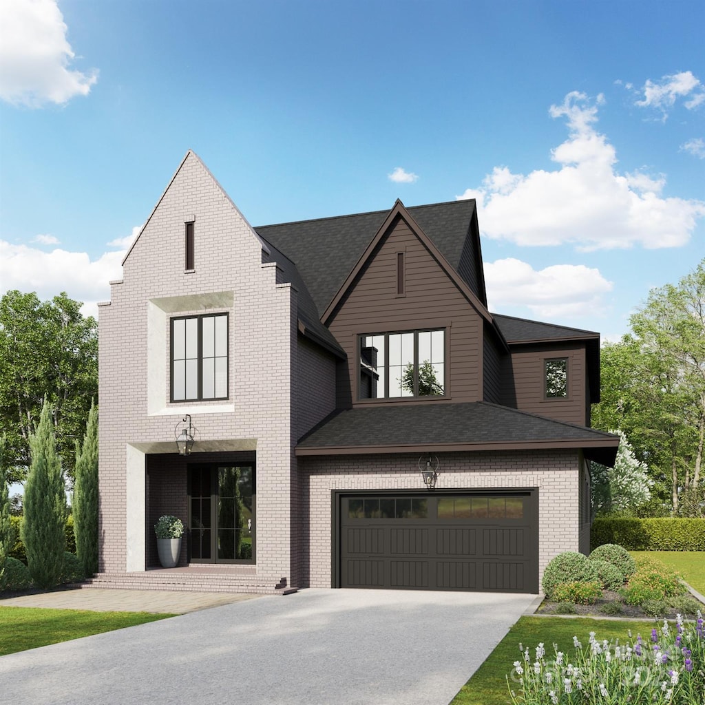 4105 Walker Rd, Charlotte, NC 28211 - view of front of house with concrete driveway, roof with shingles, brick siding, and an attached garage
