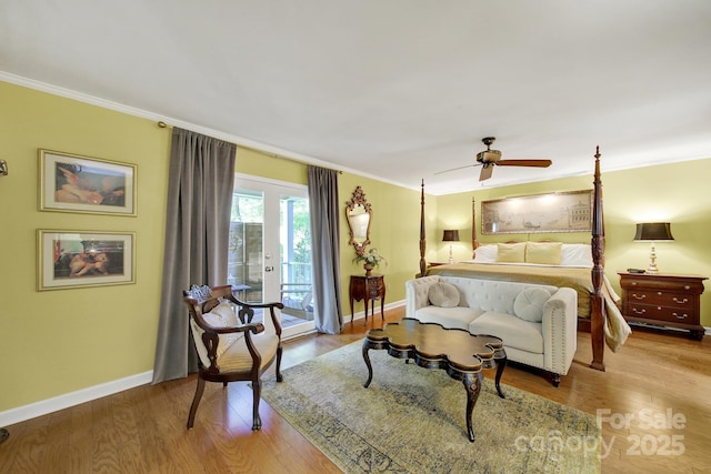 bedroom featuring crown molding, ceiling fan, access to exterior, baseboards, and wood finished floors