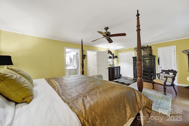 bedroom featuring ornamental molding, a ceiling fan, wood finished floors, and multiple windows