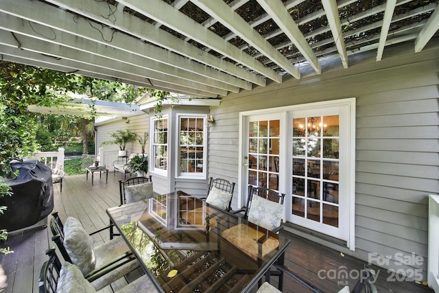 deck featuring outdoor dining space