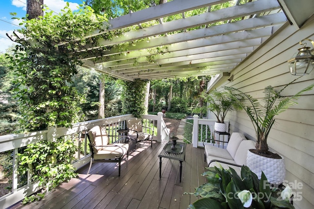 deck featuring a pergola