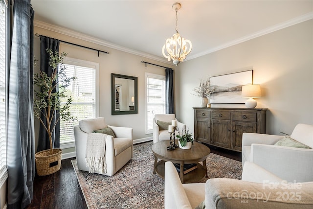 405 Five Leaf Ln, Waxhaw, NC 28173 - living area featuring a chandelier, a wealth of natural light, dark wood-style flooring, and ornamental molding