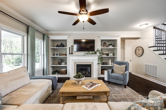 405 Five Leaf Ln, Waxhaw, NC 28173 - living room with a wealth of natural light, ornamental molding, visible vents, stairway, and wood finished floors