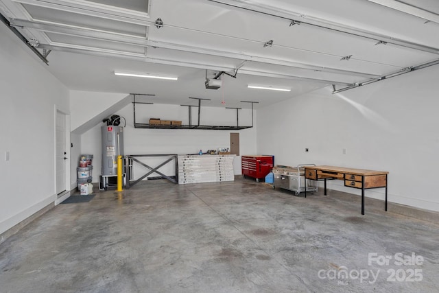garage with water heater and a garage door opener