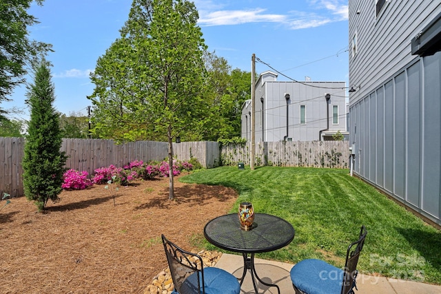 view of yard with a fenced backyard