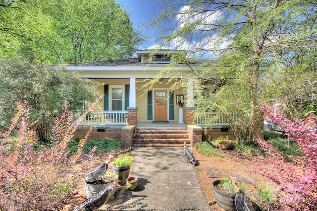 1000 E 35th St, Charlotte, NC 28205 - bungalow-style home featuring a porch, crawl space, and a shingled roof