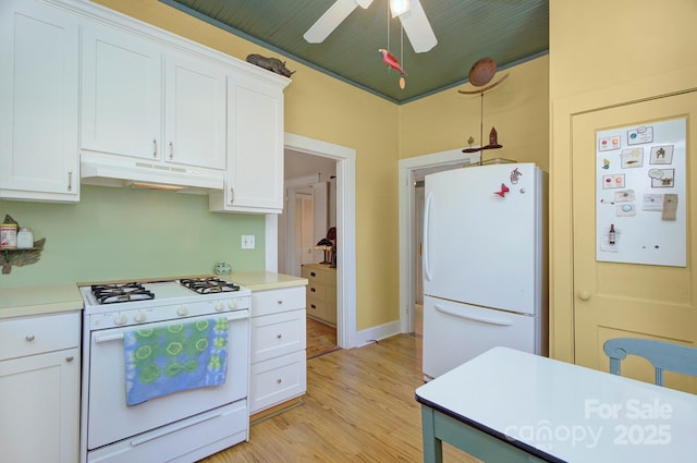1000 E 35th St, Charlotte, NC 28205 - kitchen featuring light wood-style flooring, white appliances, ceiling fan, light countertops, and under cabinet range hood