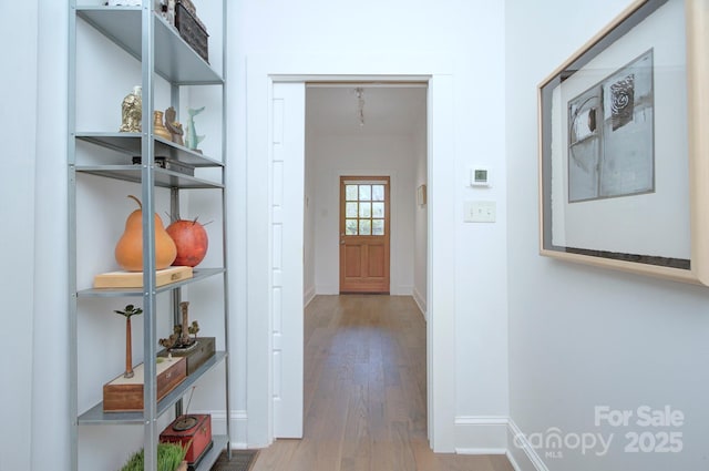 1000 E 35th St, Charlotte, NC 28205 - hallway with baseboards and wood finished floors