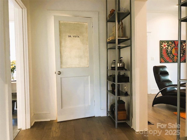1000 E 35th St, Charlotte, NC 28205 - doorway to outside featuring dark wood-style flooring