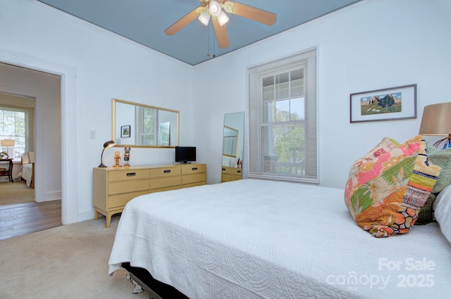 1000 E 35th St, Charlotte, NC 28205 - bedroom with ceiling fan and light carpet