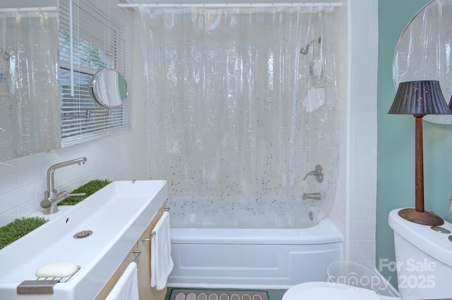 1000 E 35th St, Charlotte, NC 28205 - bathroom with tasteful backsplash, vanity, toilet, and shower / bath combo