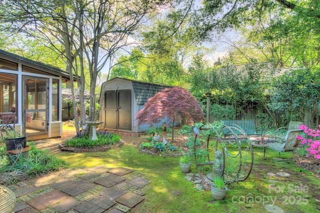 1000 E 35th St, Charlotte, NC 28205 - view of shed with fence and a sunroom
