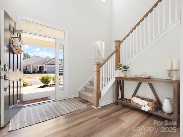 5532 Muckross Ln, Fort Mill, SC 29707 - foyer featuring baseboards, stairway, and wood finished floors