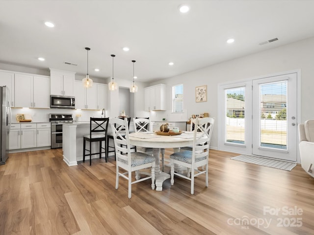 5532 Muckross Ln, Fort Mill, SC 29707 - dining space featuring visible vents, light wood-type flooring, and recessed lighting