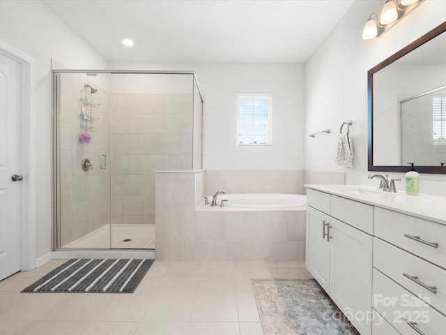 5532 Muckross Ln, Fort Mill, SC 29707 - full bath featuring vanity, tile patterned floors, a stall shower, and a garden tub