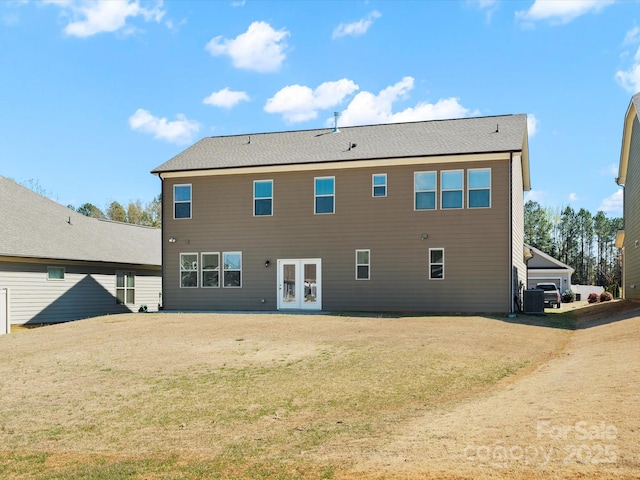 5532 Muckross Ln, Fort Mill, SC 29707 - back of house featuring french doors, central AC unit, and a lawn