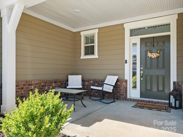 5532 Muckross Ln, Fort Mill, SC 29707 - doorway to property featuring brick siding and a patio