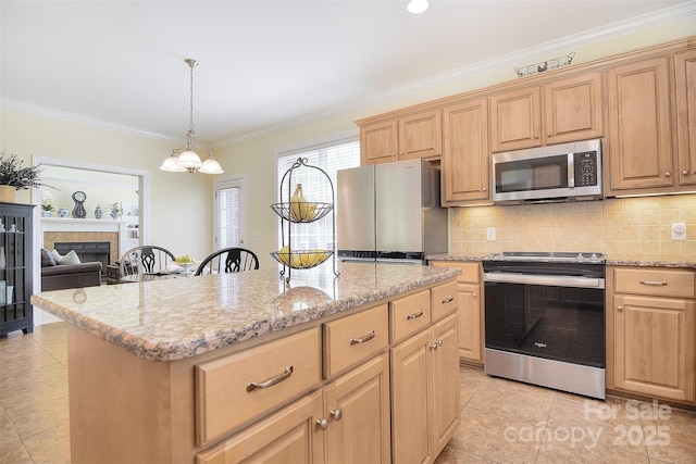 kitchen with decorative backsplash, ornamental molding, light stone counters, and appliances with stainless steel finishes