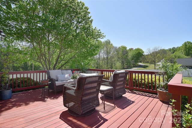 deck featuring an outdoor living space