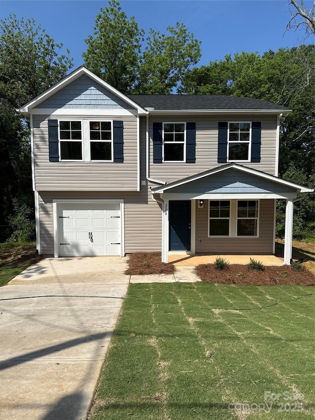bi-level home featuring a garage, covered porch, concrete driveway, and a front lawn
