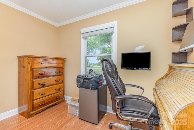 home office featuring crown molding, baseboards, and wood finished floors