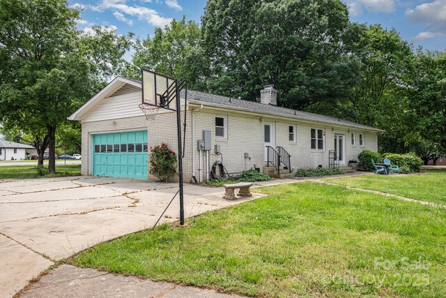 ranch-style house with a front yard, a chimney, brick siding, entry steps, and an attached garage