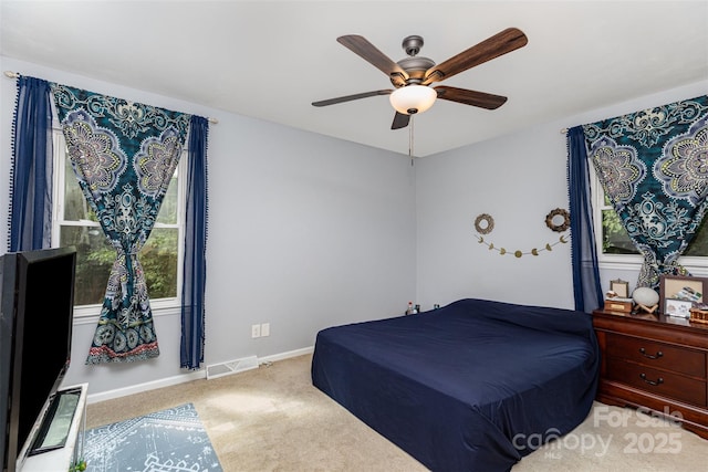 4813 Carving Tree Dr, Mint Hill, NC 28227 - carpeted bedroom with ceiling fan, visible vents, and baseboards