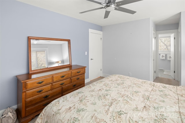 34 Turnberry Dr, Arden, NC 28704 - bedroom featuring ensuite bath, a ceiling fan, and baseboards