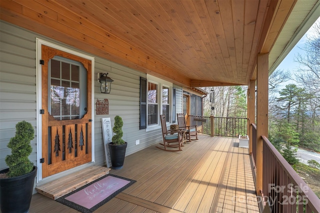 7788 Parks Mountain Dr, Newland, NC 28657 - wooden terrace with a porch